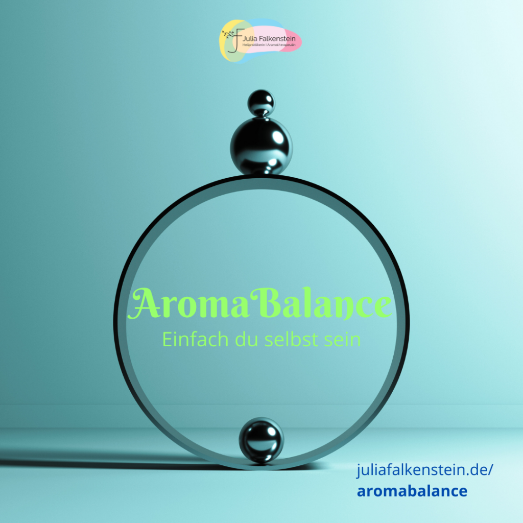Symbolbild für Balance und Darmgesundheit: Kugeln im Gleichgewicht als Sinnbild für Mikrobiom, Nervensystem und Aromatherapie.
